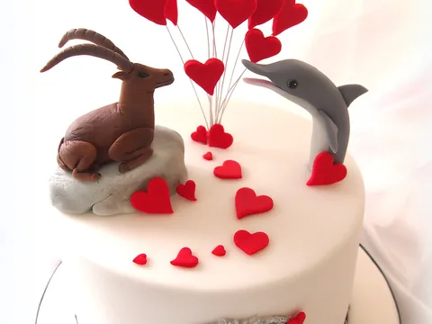 Jarac i delfin, simbolicna mladenacka