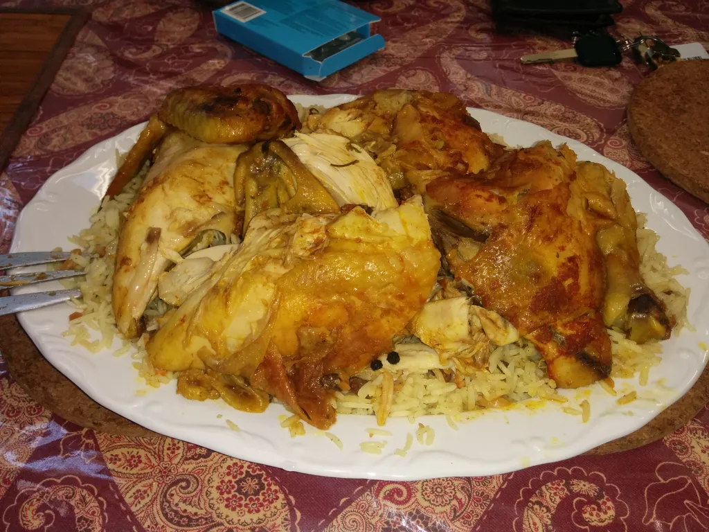 Three spice rice with whole chicken
